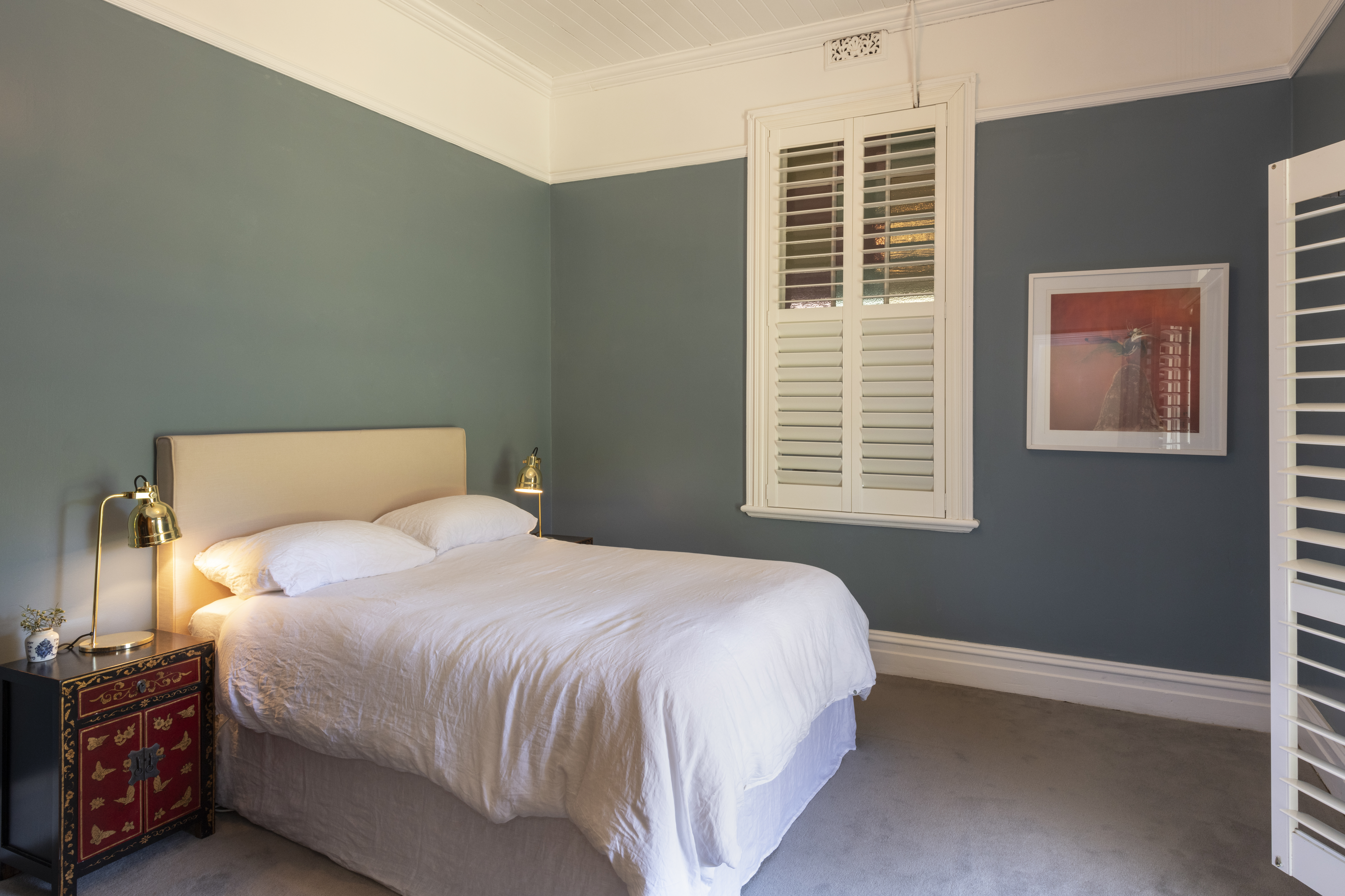 Bedroom with french doors and crisp linen sheets